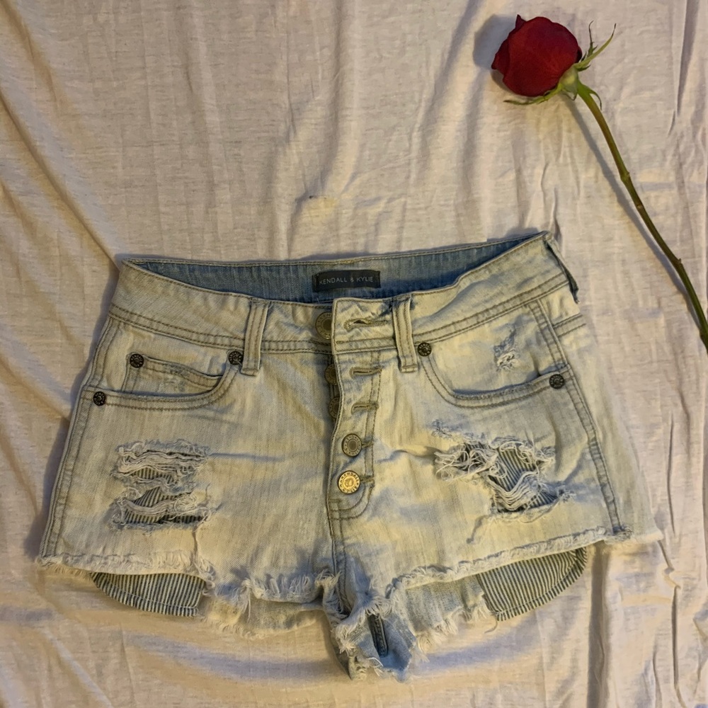 Kendall and Kylie destroyed denim shorts